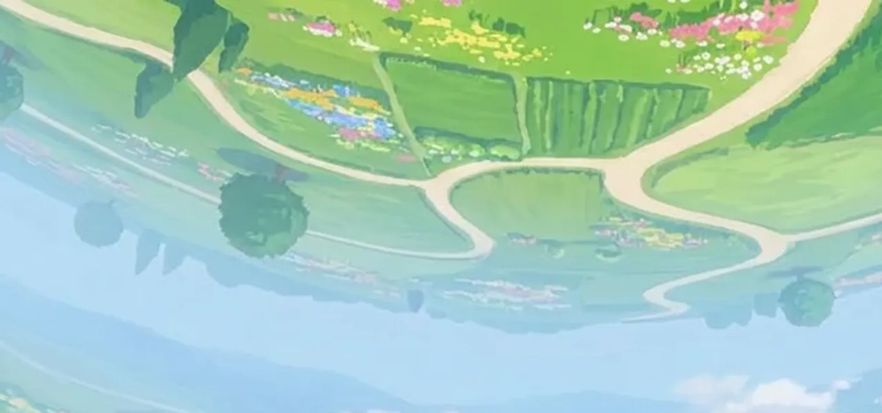 Detail of the far side: cream paths curving between fields, one field in crop stripes, flower beds of pink, yellow, blue and white along the edges, round trees with dark shadows beneath, pale blue haze toward the bottom.